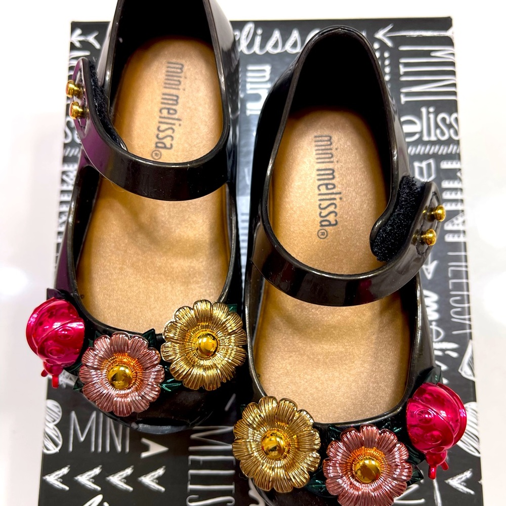 Black and metallic mini Melissa's